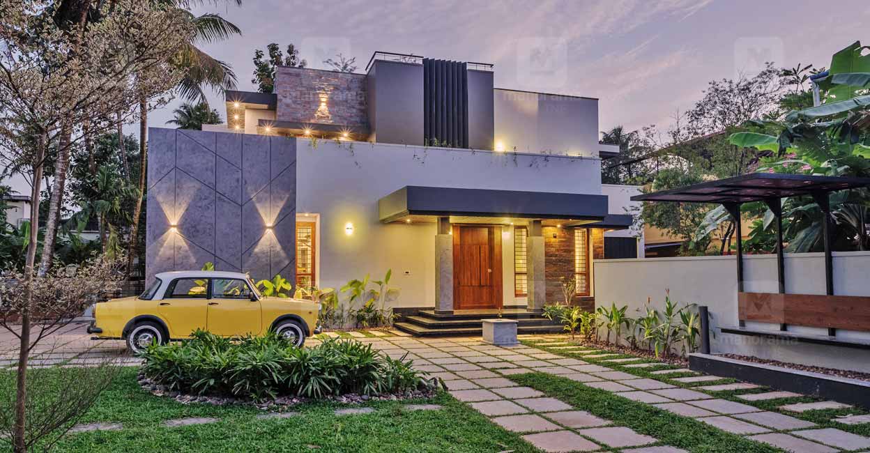 This contemporary Perumbavoor house is awesome with twin facades