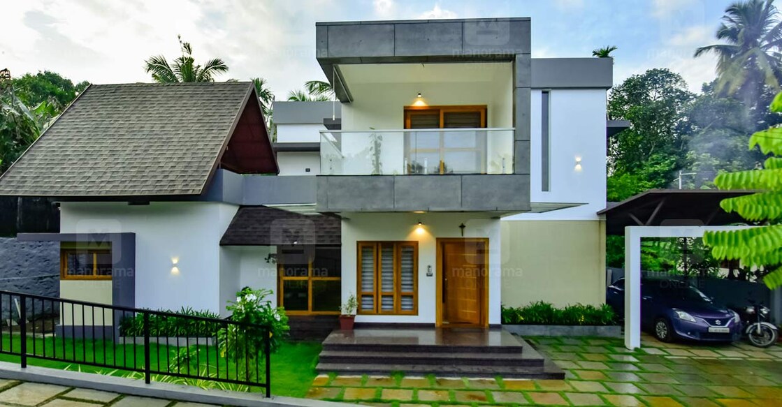 The elevation features an elegant fusion of geometrical patterns like flat, slope and curves.