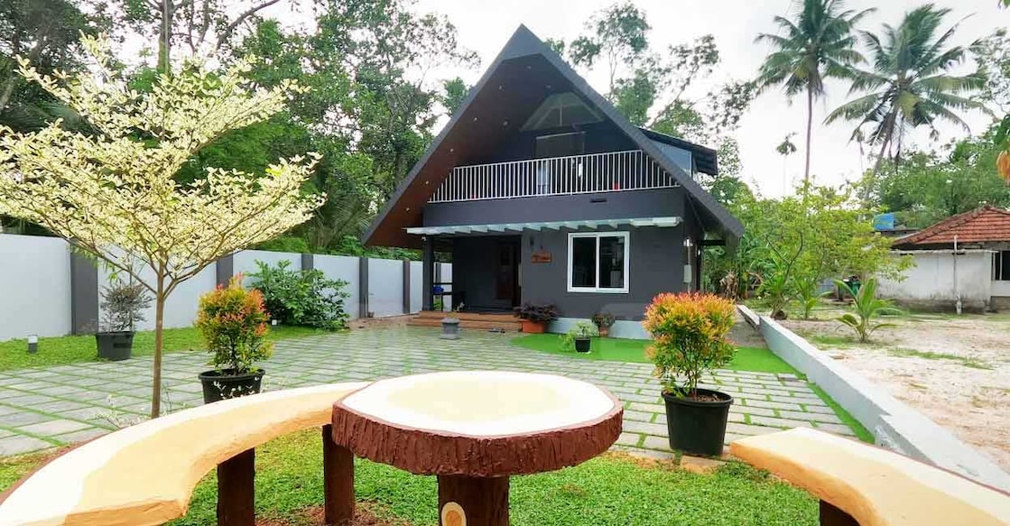 cherthala-house-01 The A-frame elevation truly grants a contemporary vibe to the house. Photo: Special arrangement