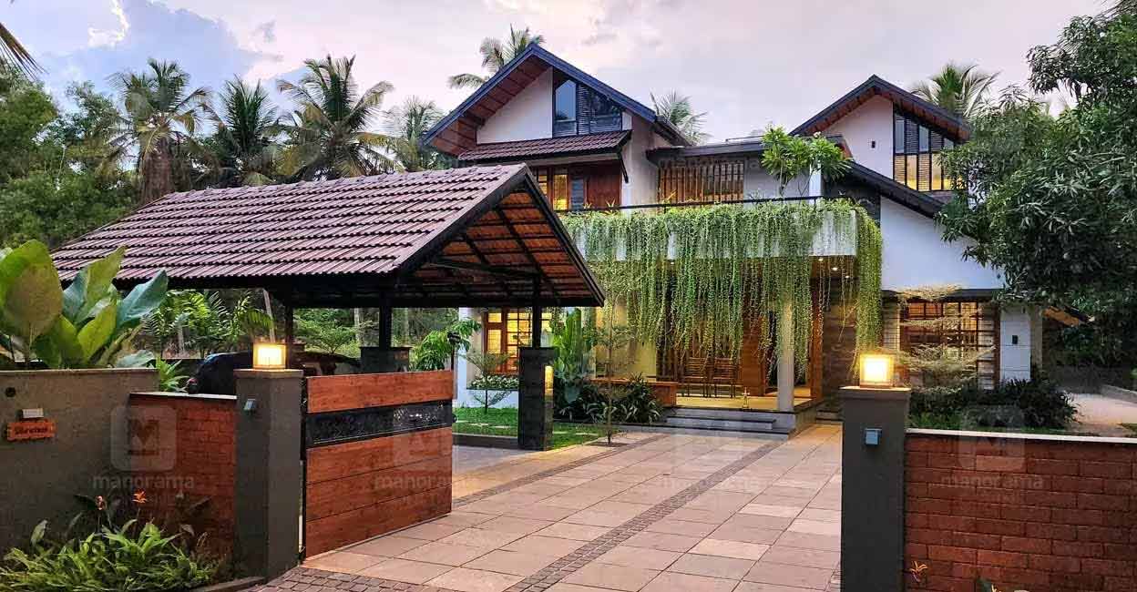 payyoli-house-01 In order to achieve the beautiful tropical vibe, GI truss roof has been installed over flat roof. Photo: Special arrangement