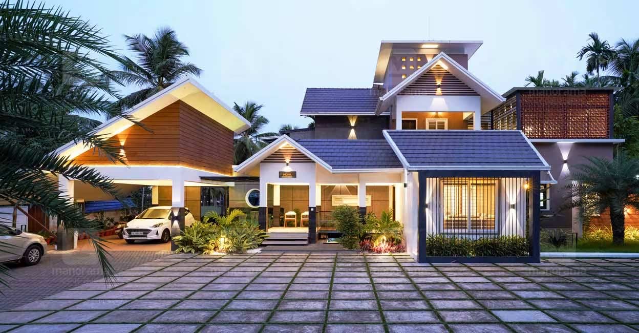 The elevation of the house features a fusion style of flat–slope and curved roofs. Photo: Special arrangement