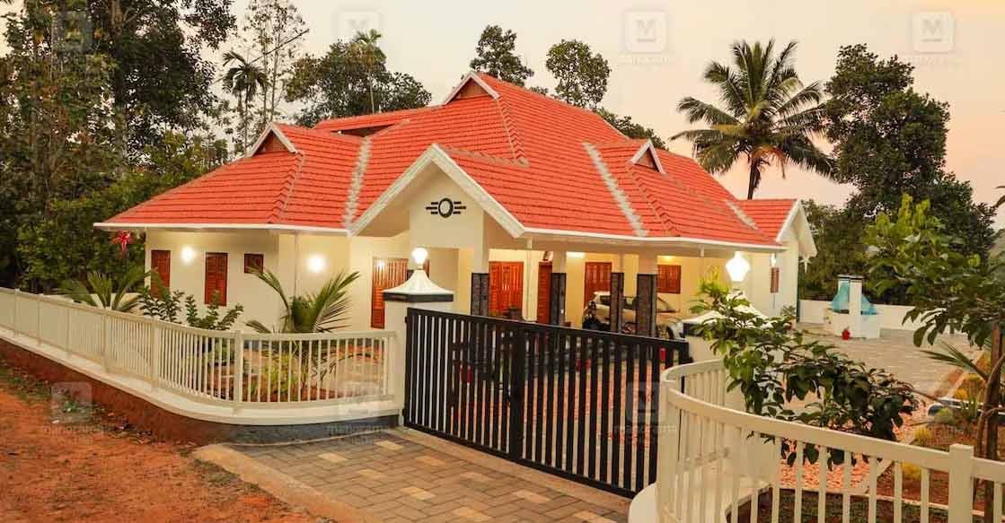 kanjirappally-house-01-c The colourful sloped roof in multiple layers adds a traditional charm to the elevation of the house. Photo: Special arrangement