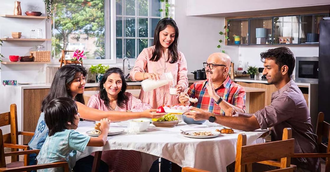dining-table-c The dining table plays a significant role in strengthening family bonds. Photo: Factory.com/ Shutterstock.com