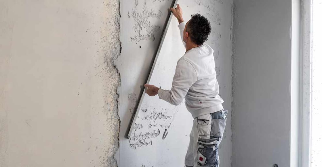 gypsum-plastering-c Gypsum plastering involves applying a mixture of gypsum powder and water to the walls, eliminating the need for cement and sand. Photo: Sabrewolf/Shutterstock.com