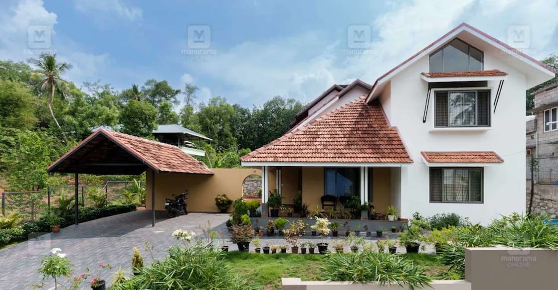 tvpm-house-main-c The interiors exude tropical vibes with its wooden-themed floor tiles and white-coloured walls. Photo: Special arrangement