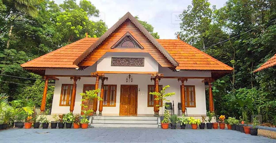 The elevation that exudes traditional charm with clay tiled sloped roof, spacious sit-out and long landscape are the highlights of this house. Photo: Special arrangement