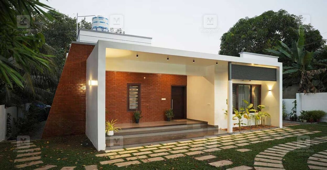 The contemporary box-style elevation of this house which stands in a 15-cent rectangular plot perfectly complements the size of the structure. Photo: Ajith
