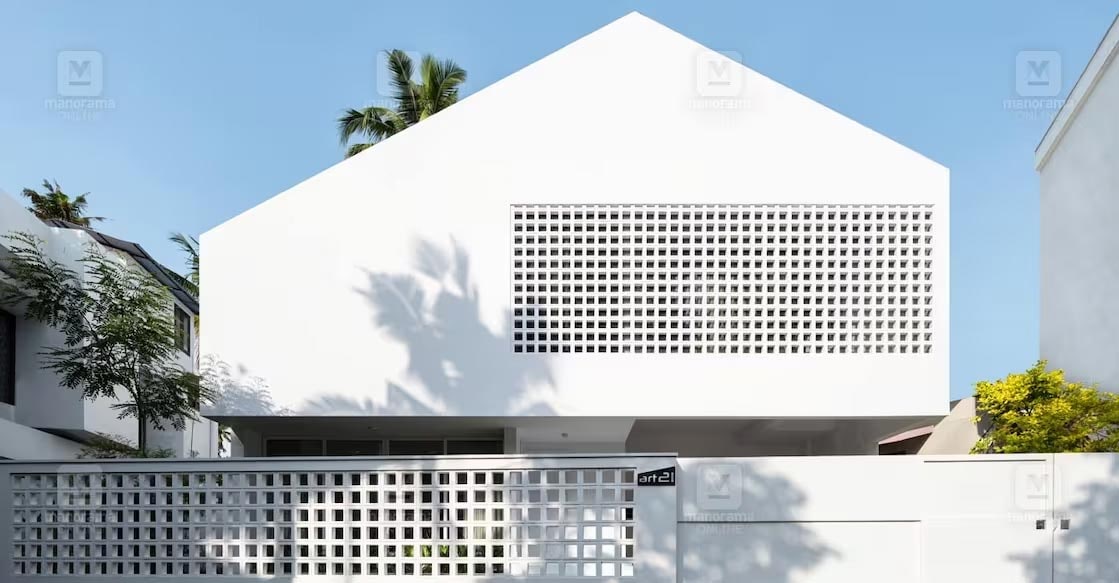 tvpm-house-1-c The elevation features a mix of triangular and elongated rectangular shapes, enriched with numerous square ‘jali’ lattices. Photo: Special arrangement
