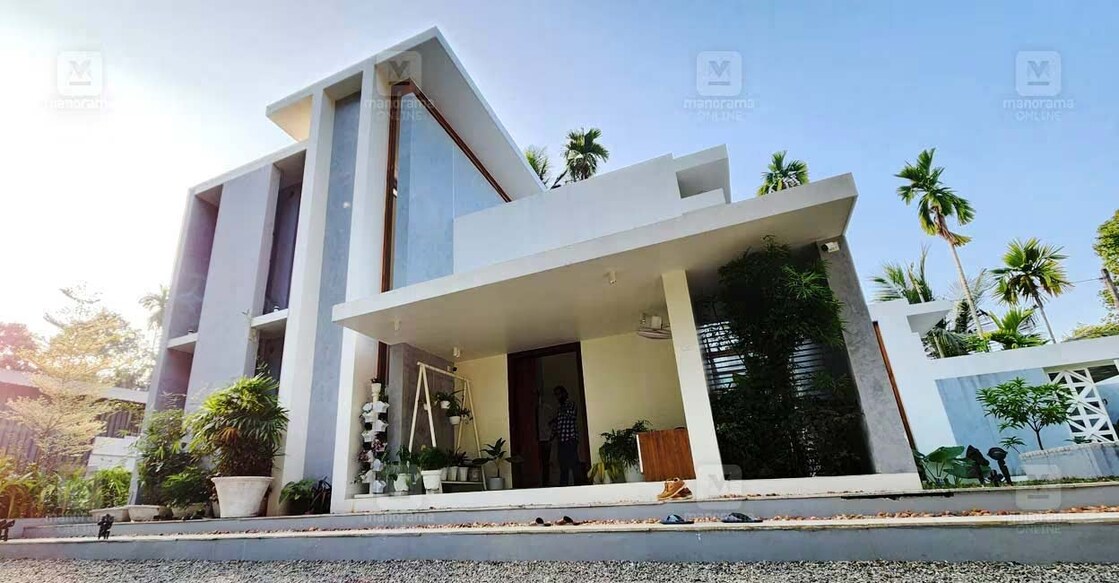 The base colour theme of the house is terracotta-cement texture finish. Photo: Ajith