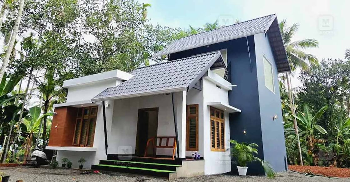 mlappuram-house-01-c Tile paved GI truss roof in two layers adds height, while granting a chic look to the elevation. Photo: Special arrangement
