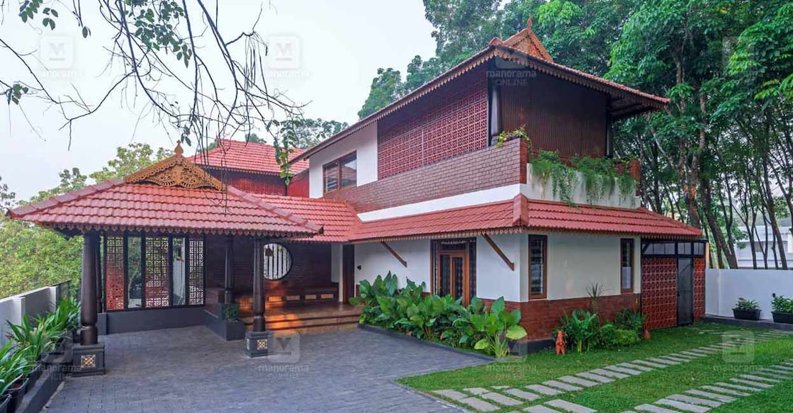 kizhakkambalam-house-01-c The earthy tones grant a rustic charm to the elevation. Photo: Ajith