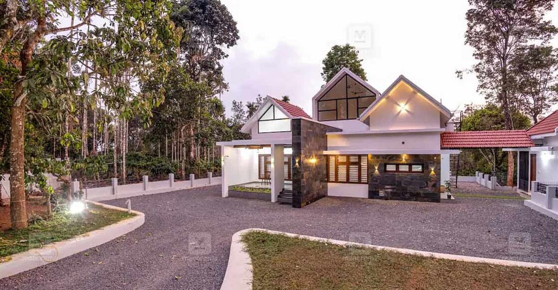 Three sloped roofs, with toughened glass panelling, highlight the elevation pattern of the house. Photo: Special arrangement