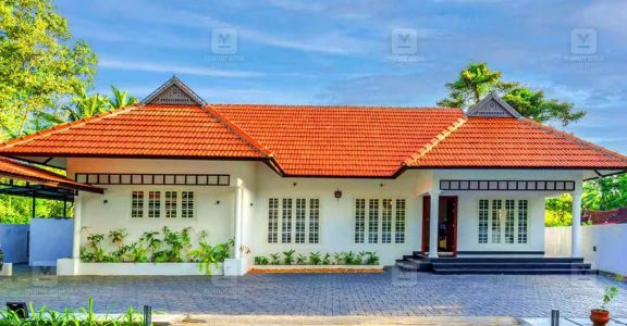 Basking in enigmatic white hue, this single-storey Vaikom house exudes class