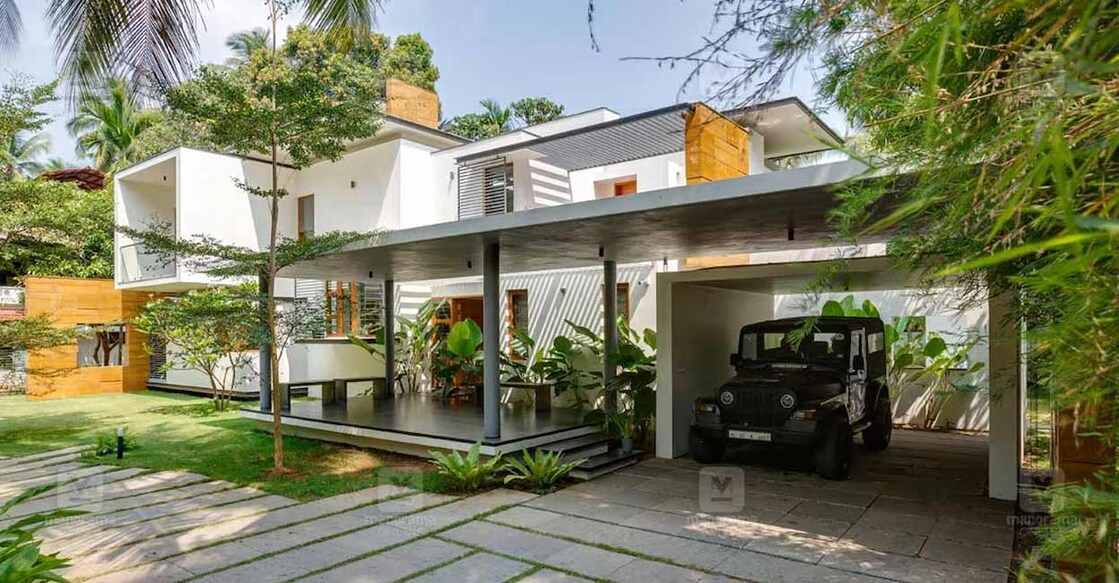 The elevation is quite simple as the house is concealed behind thick foliage and greenery. Photo: Special arrangement