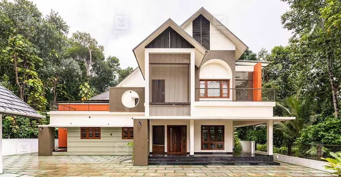 koyttayam-house-c-1 The roof is a fusion design, blending truss and flat roof styles. Photo: Special arrangement