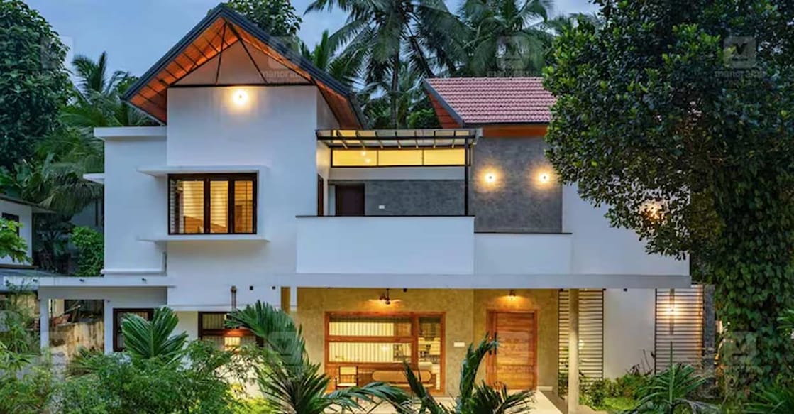 The house is designed in a traditional-modern style, blending flat and sloping elements in its exterior. Photo: Special arrangement