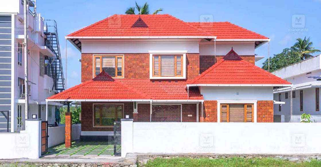 spacious-house-1-c The sloping roof with multiple layers of tiles is a striking exterior feature. Photo: Special arrangement