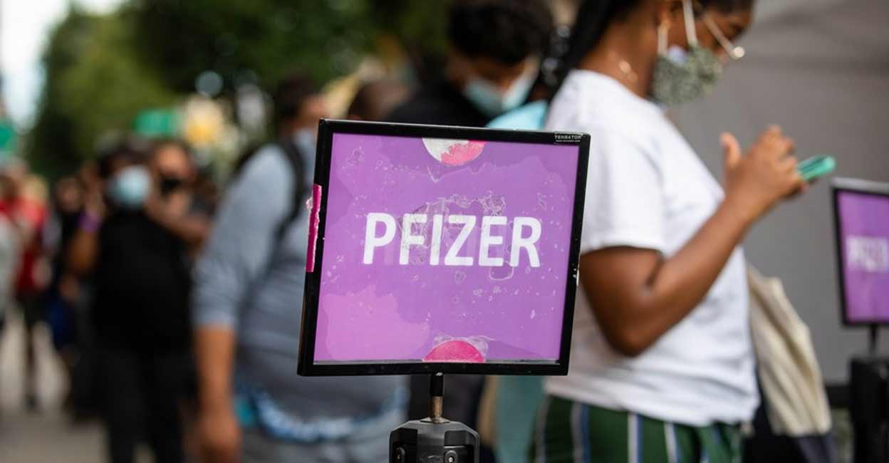 People wait in line to receive the Pfizer/BioNTech COVID-19 vaccine at a mobile vaccine clinic in the Brooklyn borough of New York, United States, Aug. 23, 2021. (Photo by Michael Nagle/Xinhua/IANS) Representative image: IANS