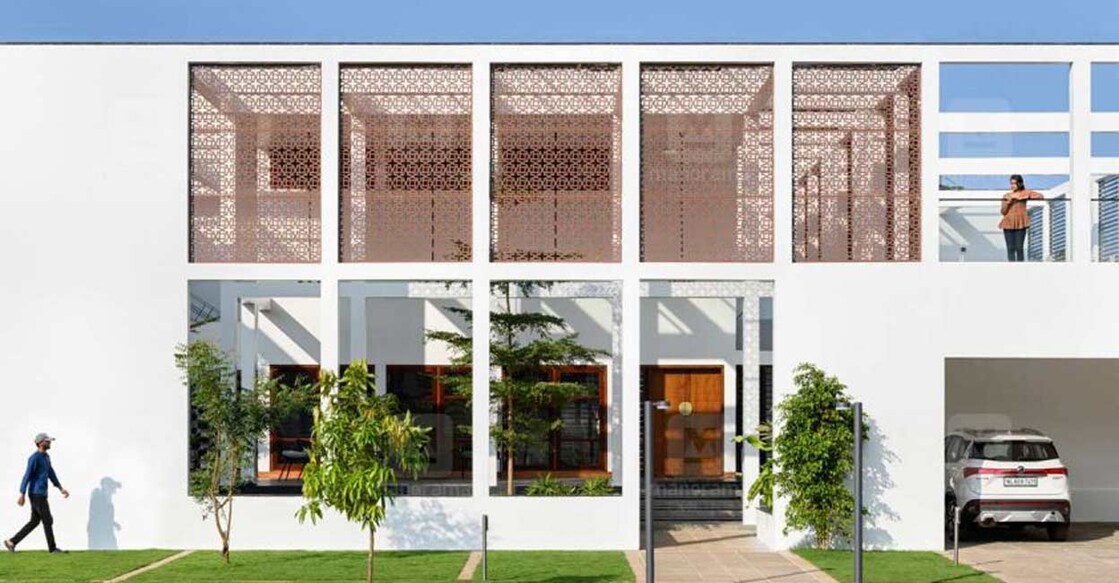 The CNC jalis in steel and glass grant a regal yet modern look to the elevation. 