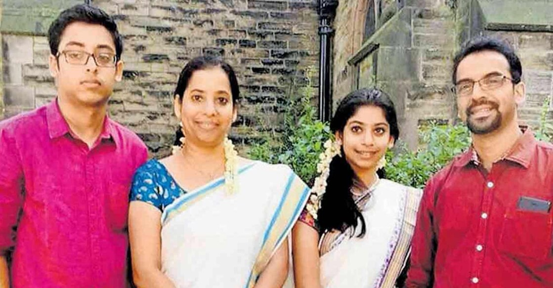 Jasmine (2L) with husband David (far right) daughter Riyona (2R) and son Riyan.