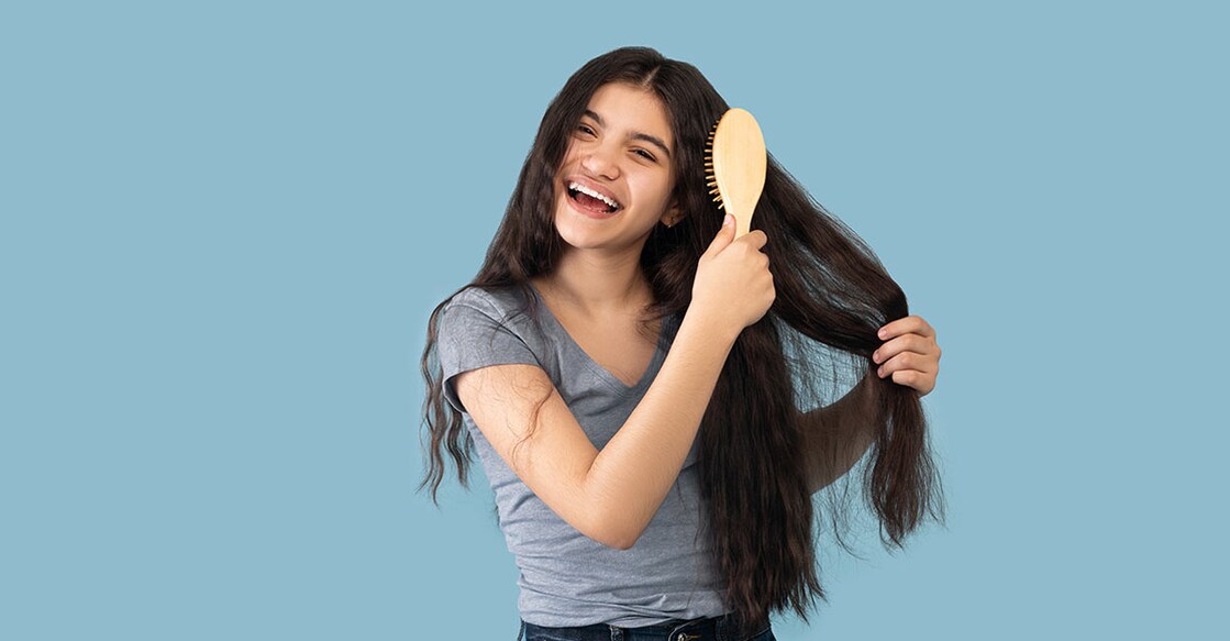 hair-care Gooseberry is best to help maintain the natural hair colour. Photo: Shutterstock/Prostock-studio