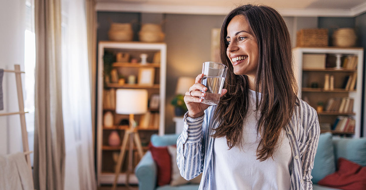 You could drink a glass of water as soon as you wake up followed by a palmful of almonds or walnuts. Photo: iStock/milorad kravic
