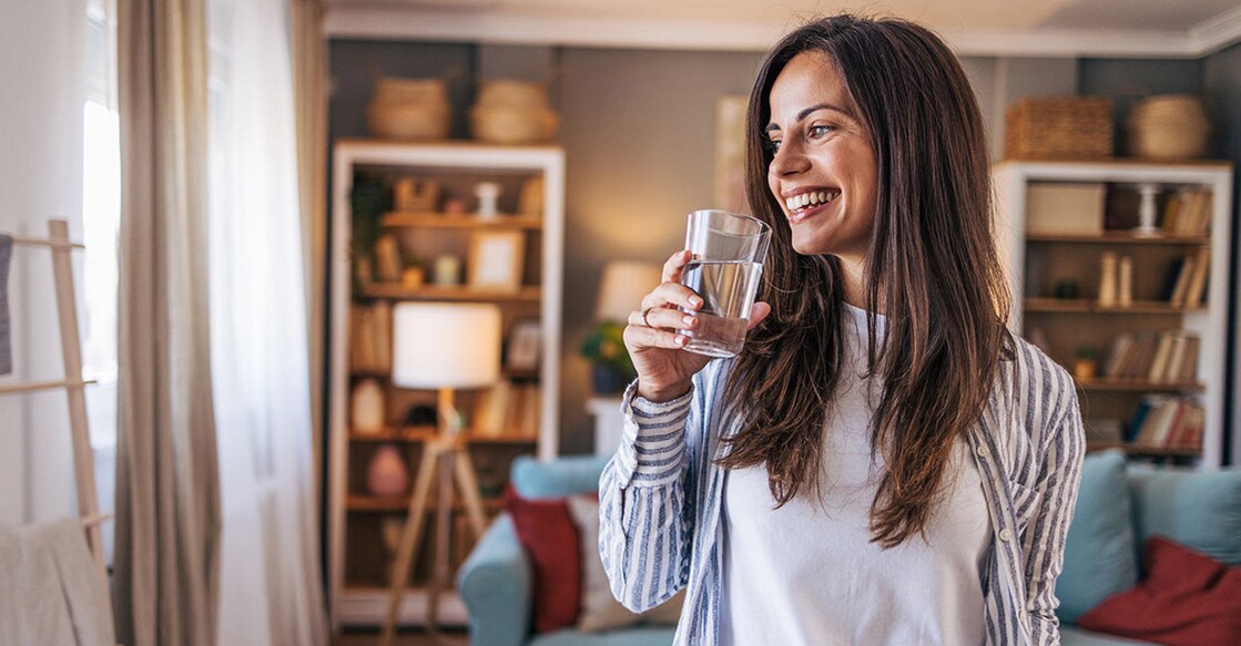 You could drink a glass of water as soon as you wake up followed by a palmful of almonds or walnuts. Photo: iStock/milorad kravic
