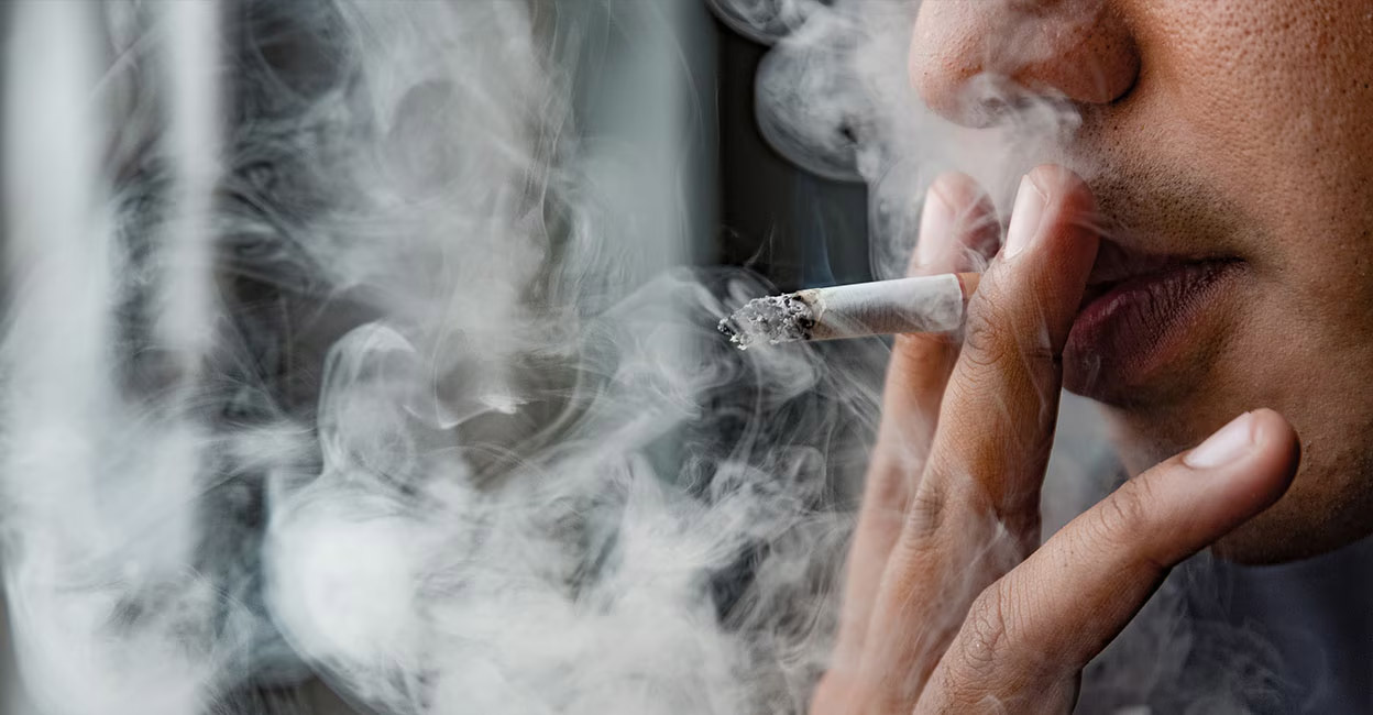 The nicotine in tobacco reduces saliva production, which is essential for neutralising the acids in the mouth and removing the food particles. Photo: iStock/pattanasri