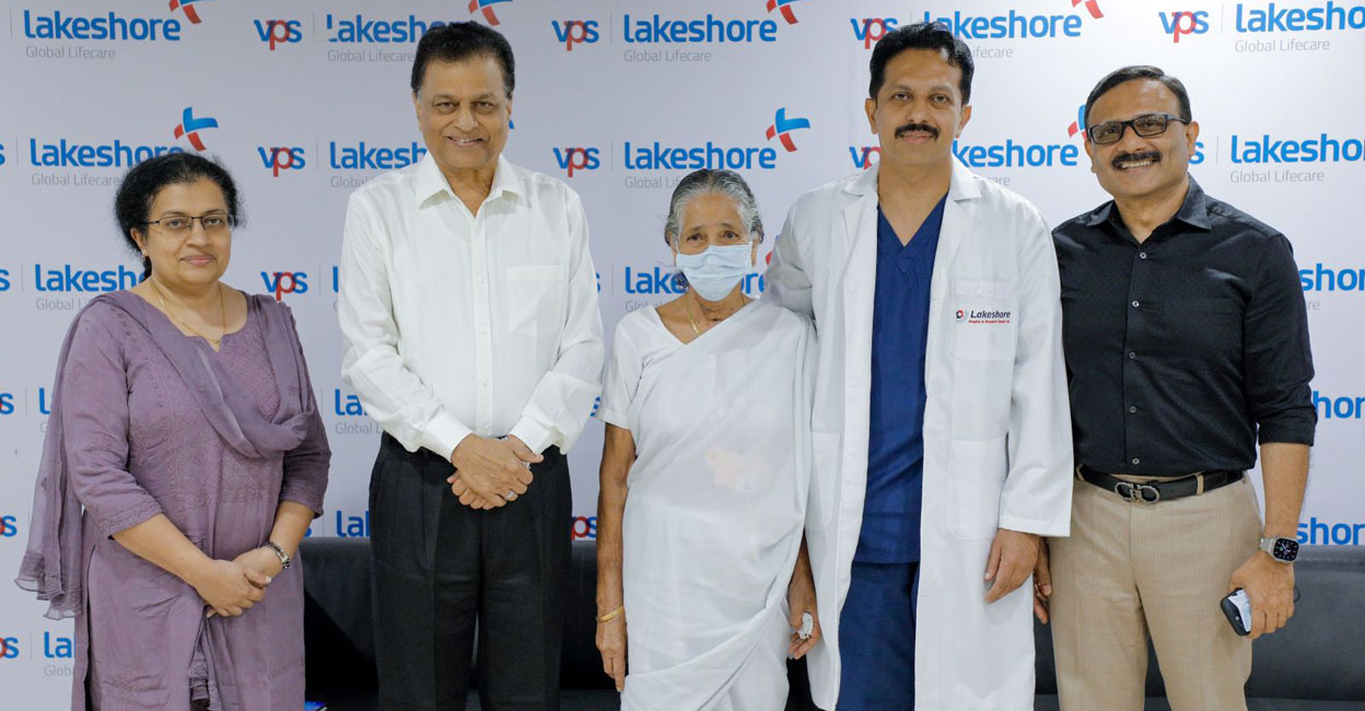 lakeshore-hospital-endo-robotic-surgery Devakiamma (centre), the world's first patient to undergo endo-robotic surgery for oesophagal cancer, poses after the procedure at Lakeshore Hospital in Kochi. Photo: Special arrangement