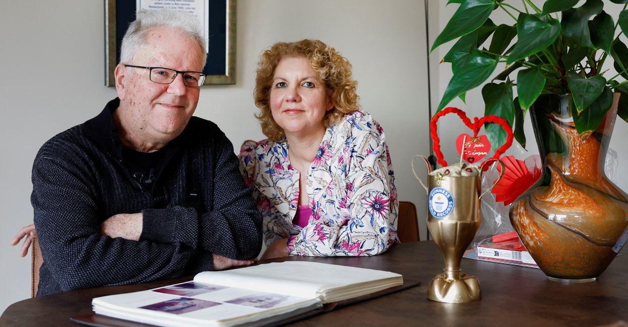 Bert Janssen, 57 years old, and his wife Petra pose in their house in Herkenbosch, Netherlands February 29, 2024. He underwent a heart transplant at the age of 17, almost 40 years ago, receiving a donor heart which is now immortalized in the Guinness Book of Records. Photo: Reuters