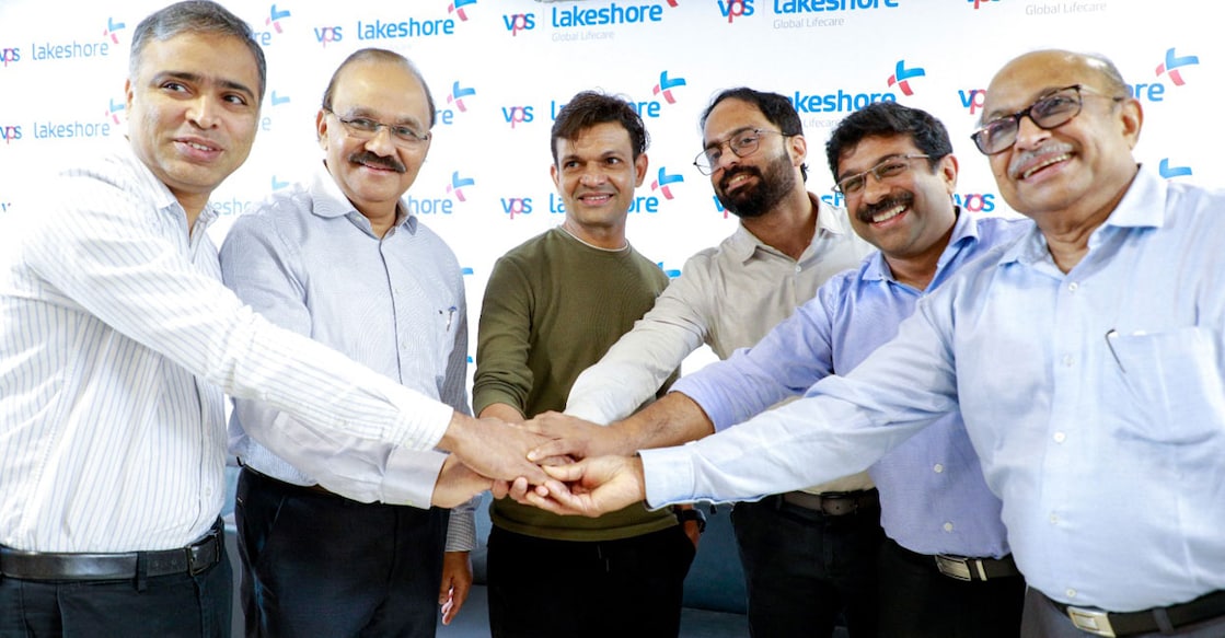 mohan-kambrath-liver-kidney-transplant Mohan Kambrath (in green t-shirt) with (from left) Dr Fadl H Veerankutty, Dr Abi Abraham, Dr Jithin S Kumar, Dr Datson George P and Dr George P Abraham. Photo: Special arrangement