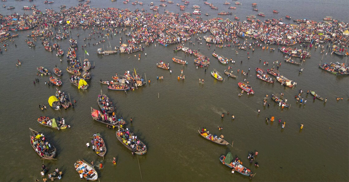 Taking a holy dip at the river in Prayagraj, where the Ganga, Yamuna and the invisible Saraswati rivers merge, is the most important ritual during Kumbh Mela. Photo: PTI