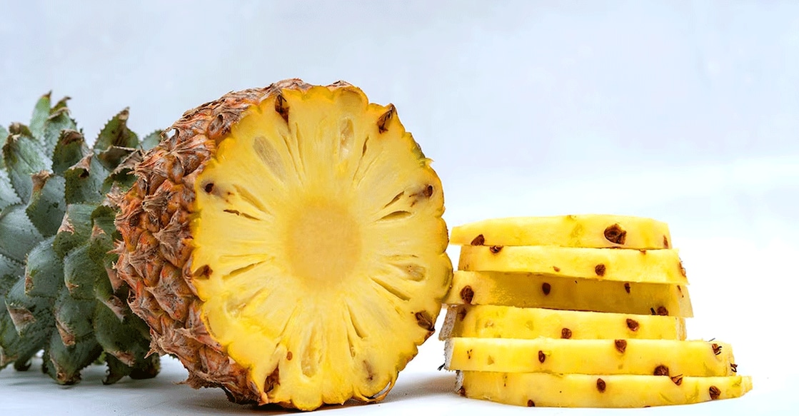 Dr Kunal Sood, in an Instagram video, says that eating pineapple a week before the period could ease menstrual pains. Photo: Instagram/@Rizly