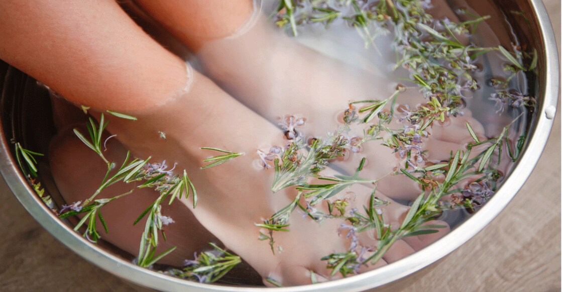 Soaking the foot in warm water infused with rosemary would improve blood circulation. Photo: iStock/Mukhina1