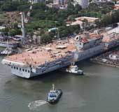 Indigenously built INS Vikrant docks at Cochin shipyard after the completion of her structural works there. Photo: Handout picture from India Navy / EV Sreekumar