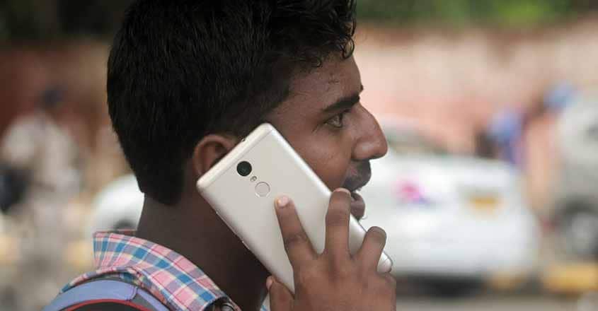 A man talks over cell phone. (File Photo: IANS) A man talks over cell phone. (File Photo: IANS)