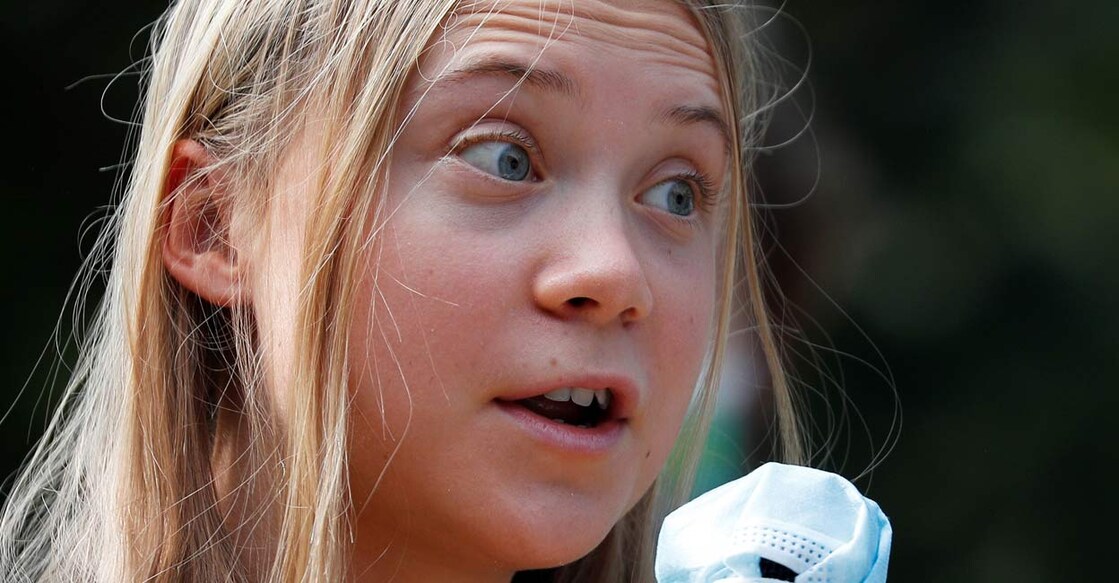 Climate activist Greta Thunberg speaks as she joins students holding a Fridays for Future climate strike in Milan, Italy. Photo: REUTERS/Guglielmo Mangiapane