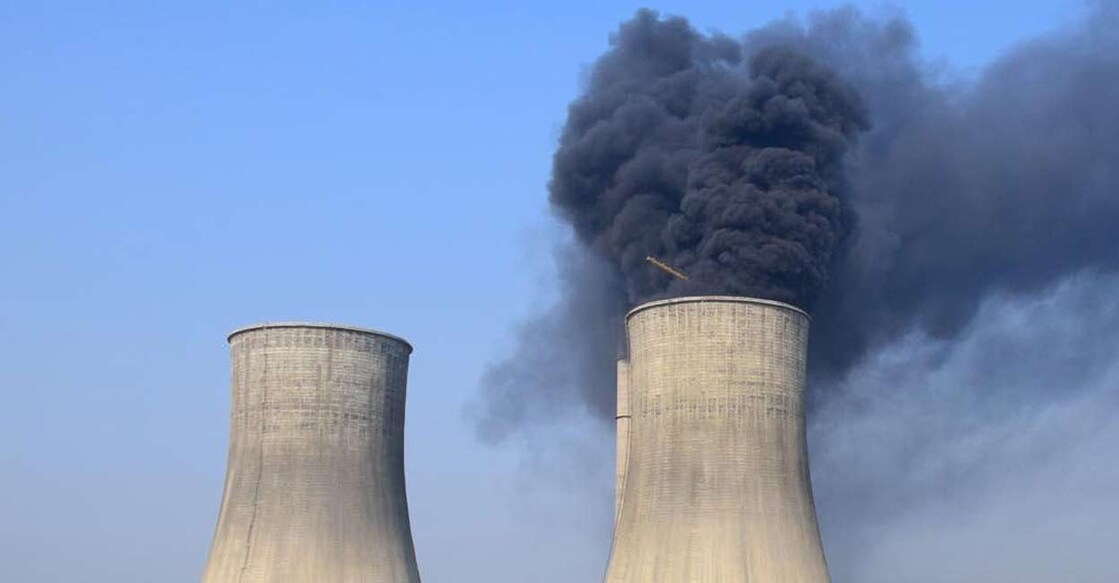 power plant. The CO2 spewed into the atmosphere since the start of the industrial revolution is closely tied to the rise in global temperature. Representative image: IANS