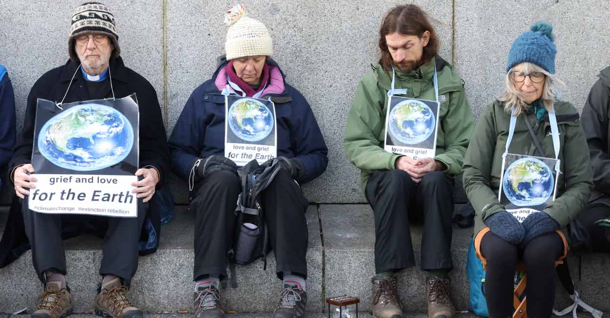 CLIMATE-UN-PROTEST People demonstrate during the UN Climate Change Conference (COP26), in Glasgow, Scotland. REUTERS/Yves Herman