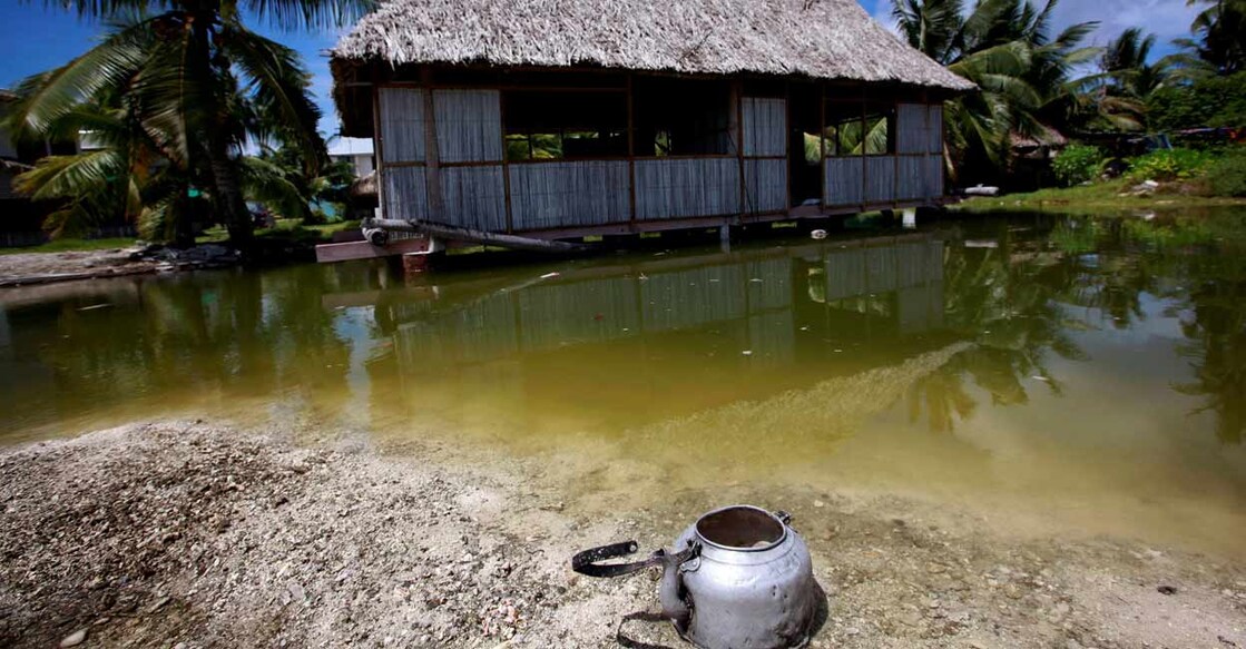 An abandoned house that is affected by seawater during high-tides in the central Pacific island nation of Kiribati. Photo: Reuters/David Gray/File Photo