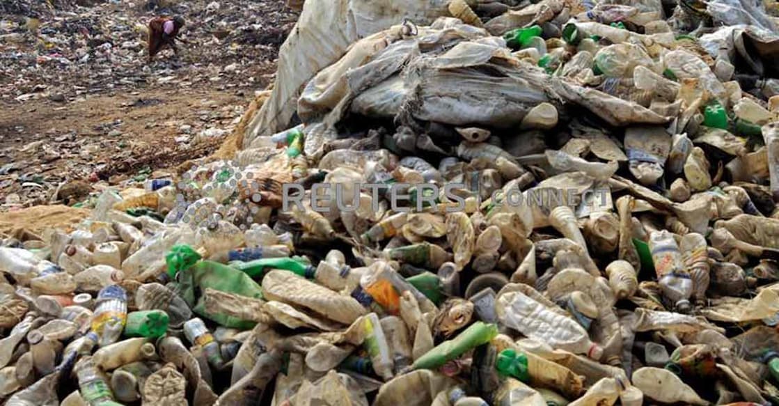 REUTERS-NEXT-PLASTIC A woman collects plastic bottles for recycling at the garbage dump on the outskirts of Agartala, Tripura. Photo: Photo: Reuters/Jayanta Dey