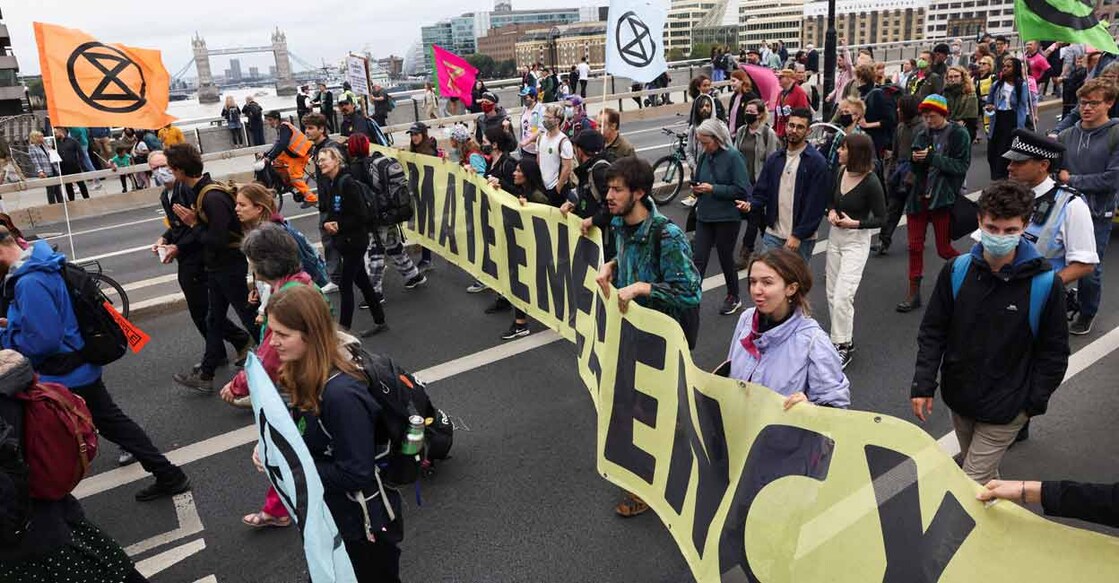 Extinction Rebellion climate demonstrators attend a protest at London Bridge, London. Photo: REUTERS/Tom Nicholson