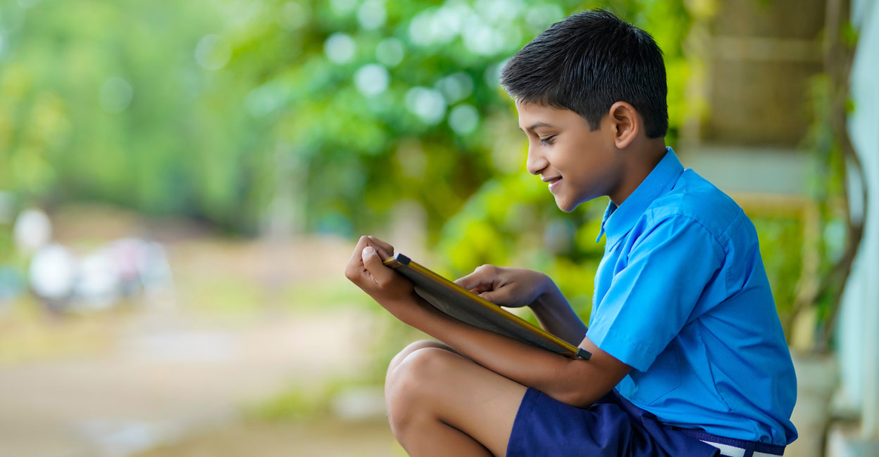 one of the best ways to encourage children's minds to grow in terms of imagination and knowledge is to read books with illustrations: Shutterstock/PRASANNAPIX
