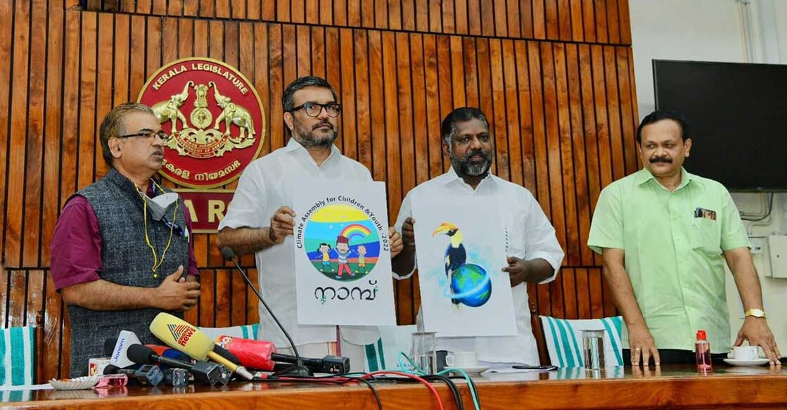Official logo and mascot of Climate Assembly being unveiled by Kerala Assembly Speaker M B Rajesh (2L) and Deputy Speaker Chittayam Gopakumar (2R) in the presence of K L Rao (far left), Chief of Social Policy, UNICEF Office for Kerala and Tamil Nadu.