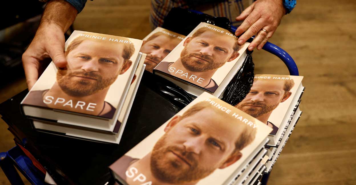 A staff member arranges Britain's Prince Harry's autobiography 'Spare' at Waterstones bookstore, in London. Photo: Reuters/Peter Nicholls