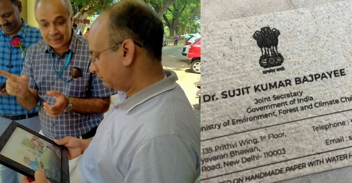 Dr Sujith Kumar Bajpayee (R) is all ears as Dr Nagendra Prabhu briefs him on the eco-friendly products and the biodegradable visiting card. Photo: Special arrangement