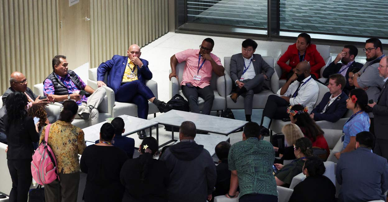 Representatives gather, on the day of COP28 draft deal negotiations, during the United Nations Climate Change Conference (COP28) in Dubai. Photo: Amr Alfiky/Reuters
