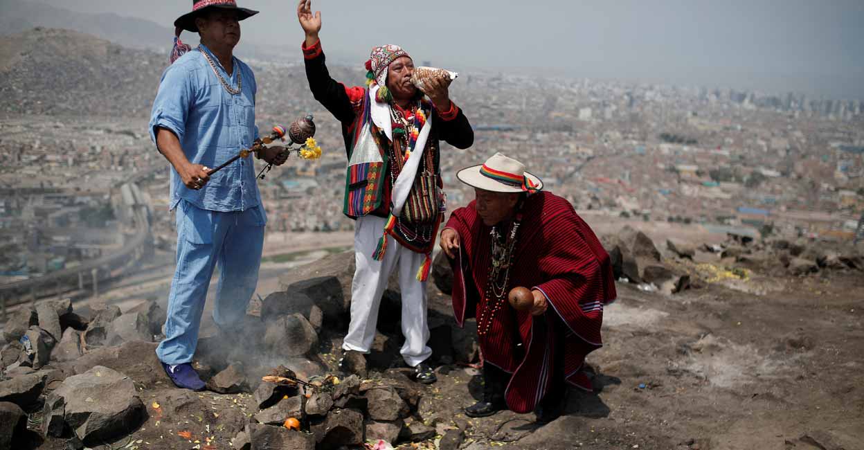 EARTH-DAY-PERU-SHAMANS Peru's shamans perform a traditional ritual and make an offer to 'Pachamama' (Mother Earth) on the eve of 'Earth Day', in Lima, Peru. Photo: Reuters/Sebastian Castaneda