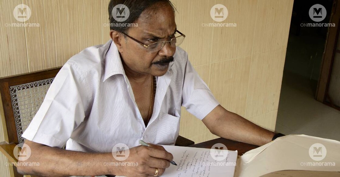 MT Vasudevan Nair engaged in writing. File Photo: Manorama