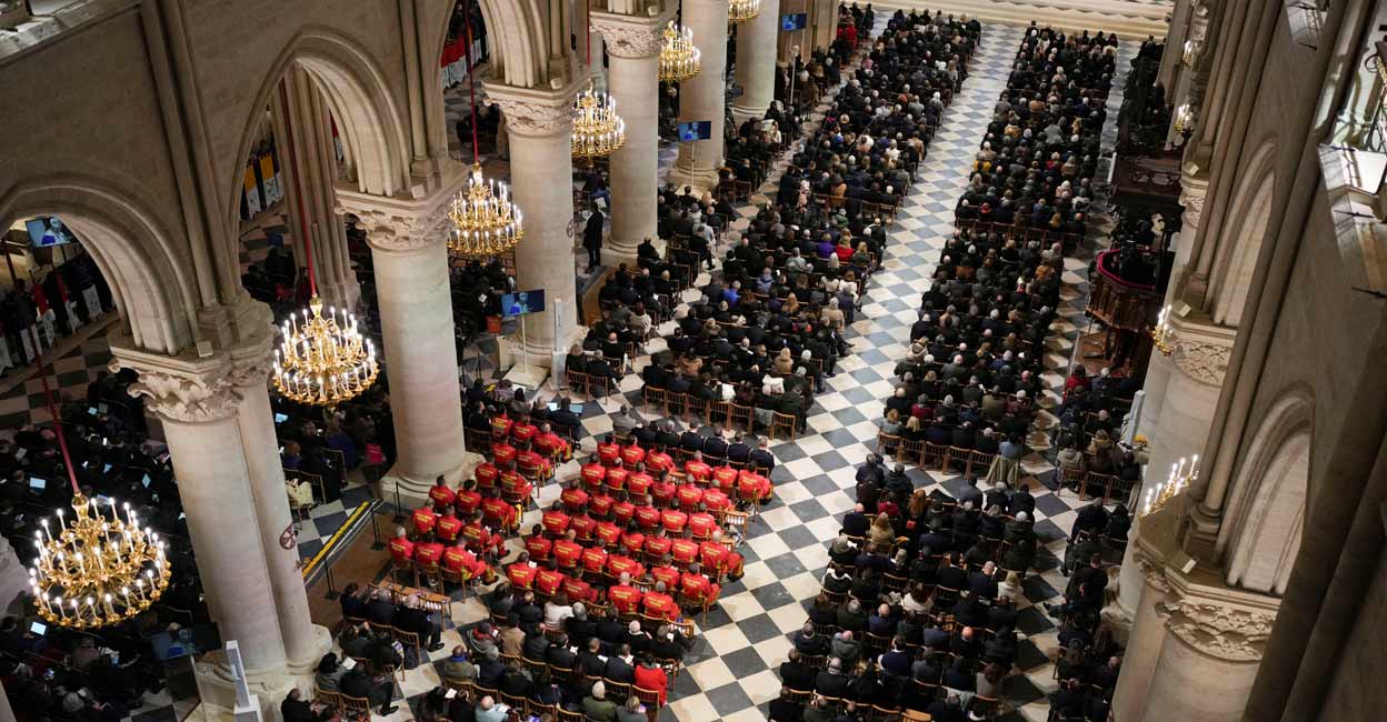 FRANCE-NOTREDAME Guest attend the service during the re-opening of the Notre-Dame de Paris Cathedral. Photo: Thibault Camus/Pool via REUTERS